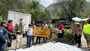 Apertura de compuerta de la presa Zimap&aacute;n